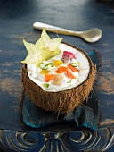Coconut soup with mango and papaya
