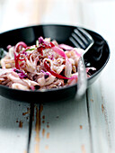 Pan-fried calamaries with red onions