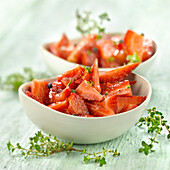 Strawberry fruit salad with thyme and balsamic vinegar
