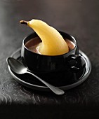 Poached pear in chocolate soup