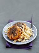 Glazed salmon noisette fillets with poppyseeds and beansprouts