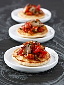 Blinis with ceps and tomatoes