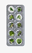 Pillenpackung mit grünem Gemüse (Symbolbild)
