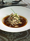 Soba vermicelli soup with seitan and mushrooms