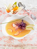 Radish and apple broth with red cabbage