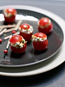 Cherry tomatoes stuffed with goat's cheese