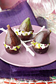 Figs stuffed with fresh goat's cheese and beetroot sprouts