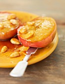 Roasted apples with almonds and caramel