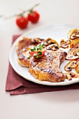 Grilled pork chops with sauteed potatoes and mushrooms
