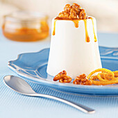 Yoghurt flan with walnuts,honey,caramel and confit citrus
