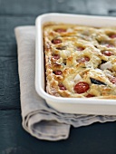 Mozzarella, tomato and sardine clafoutis