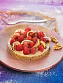 Banana, prune, almond, date, fig and raspberry tartlet