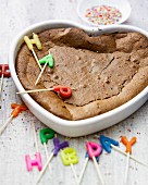 Heart-shaped chocolate birthday cake