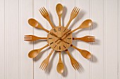 Clock made with wooden cutlery