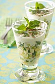 Diced cucumber and pear in cream with pine nuts