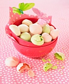 Pink and green mini meringues