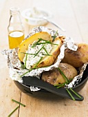 Baked potatoes with cottage cheese and herbs
