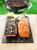 Grilled salmon cooked on one side on the barbecue