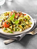 Fusilli with vegetables and rocket pesto