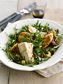 Chicken,dried fruit and rocket lettuce salad