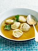 Tortelloni in a broth