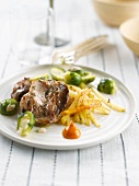 Spicy wild boar with herbs,brussels sprouts and chopped parsnips