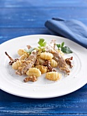 Gnocchis with thinly sliced veal and mushrooms