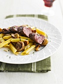Autumn hare with penne,chestnuts ,chanterelles and mousserons