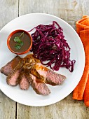Beef with gravy and pan-fried red cabbage