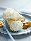 Filo pastry cones filled with ricotta and mirabelle plums