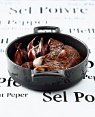 Sirloin steak casserole with shallots and garlic