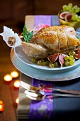 Roast duckling with figs and grapes