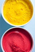 Punnet of raspberry and mango ice cream