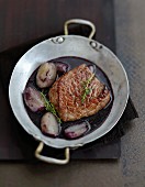 Piece of beef in red wine and shallot sauce