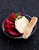 Sliced beetroot with goat's cheese