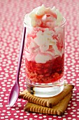 Pomegranate syrup with whipped cream and pomegranate seeds