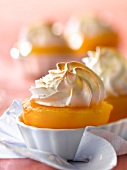 Peaches roasted in honey with meringue topping