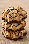 Three stacked coconut and chocolate Rochers