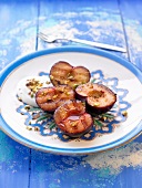 Grilled plums with pistachio cream
