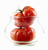 Two tomatoes in a jar