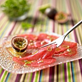 Beef carpaccio with lime and passionfruit