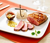 Roasted duck breast,passionfruit puree and vanilla-flavored white rice