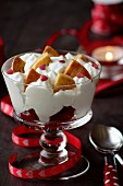A creamy dessert with raspberry and puff pastries