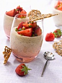 Tea-flavored blancmange with strawberries, pistachios and poppyseed tuiles