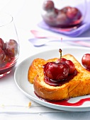 Brioche french toast topped with cherries