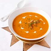 Cream of pumpkin soup with chanterelles and confit chestnuts
