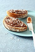 Chocolate,hazelnut and coconut spread on sliced brown bread