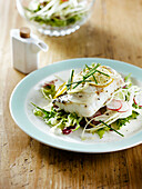 Steamed cod with lemon,cabbage and radish salad