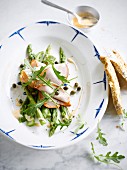 Green asparagus and caper salad with cold sliced roast pork