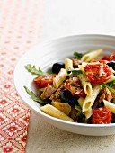 Penne with tomatoes, tuna and olives